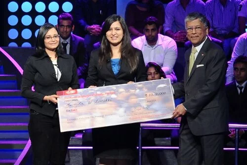 (L-R) The winners, Maumita Bhattacharjee from IIT, Delhi and Sannidhi Jhala from ISB, Mohali with Rajeev A Vaidya, President - South Asia and ASEAN, DuPont